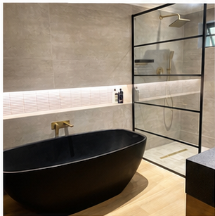 Black shower hardware in a luxury bathroom