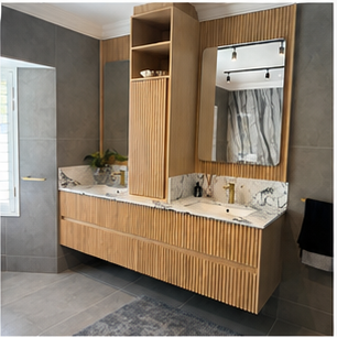Fluted vanity front with coordinated bathroom mirror