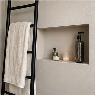 Signature Bathrooms ladder towel rail beside a recessed bathroom wall niche