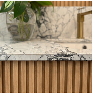 Bathroom basin and vanity composition with considered counter space