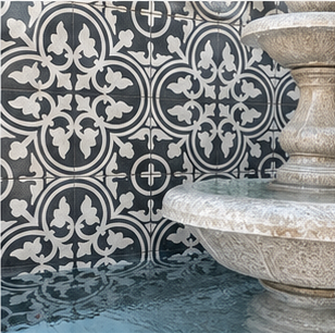 Decorative textured tile detail used as a bathroom feature surface